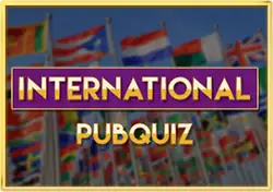 Iemand bereidt quizvragen voor op een laptop met aantekeningen en een microfoon ernaast